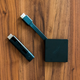 The new Roku Streaming Stick+ next to the new Amazon Fire TV.